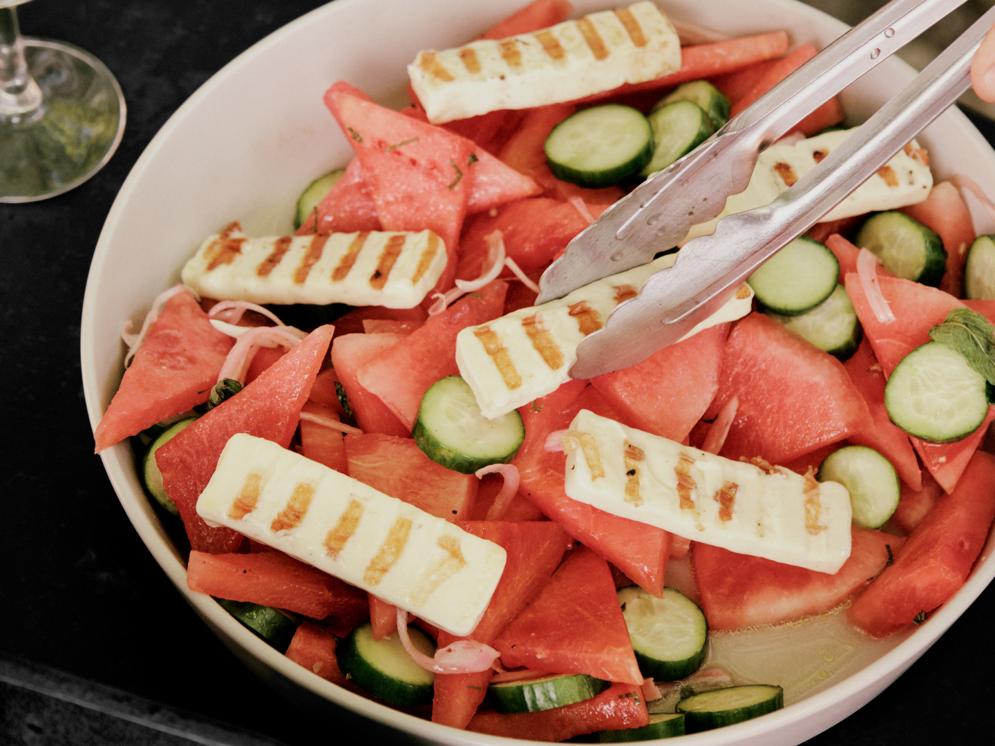 Salade de melon d’eau, concombre, et Le Populaire grillé